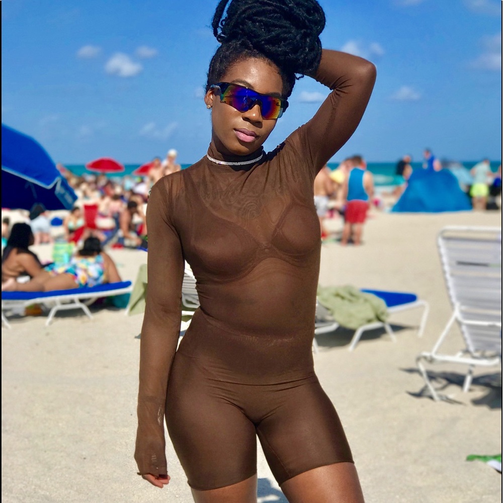 Brown mesh body suit